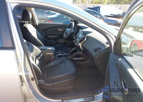 2012 Hyundai Tucson Limited z USA, uszkodzony, nr VIN KM8JUCAC2CU479548